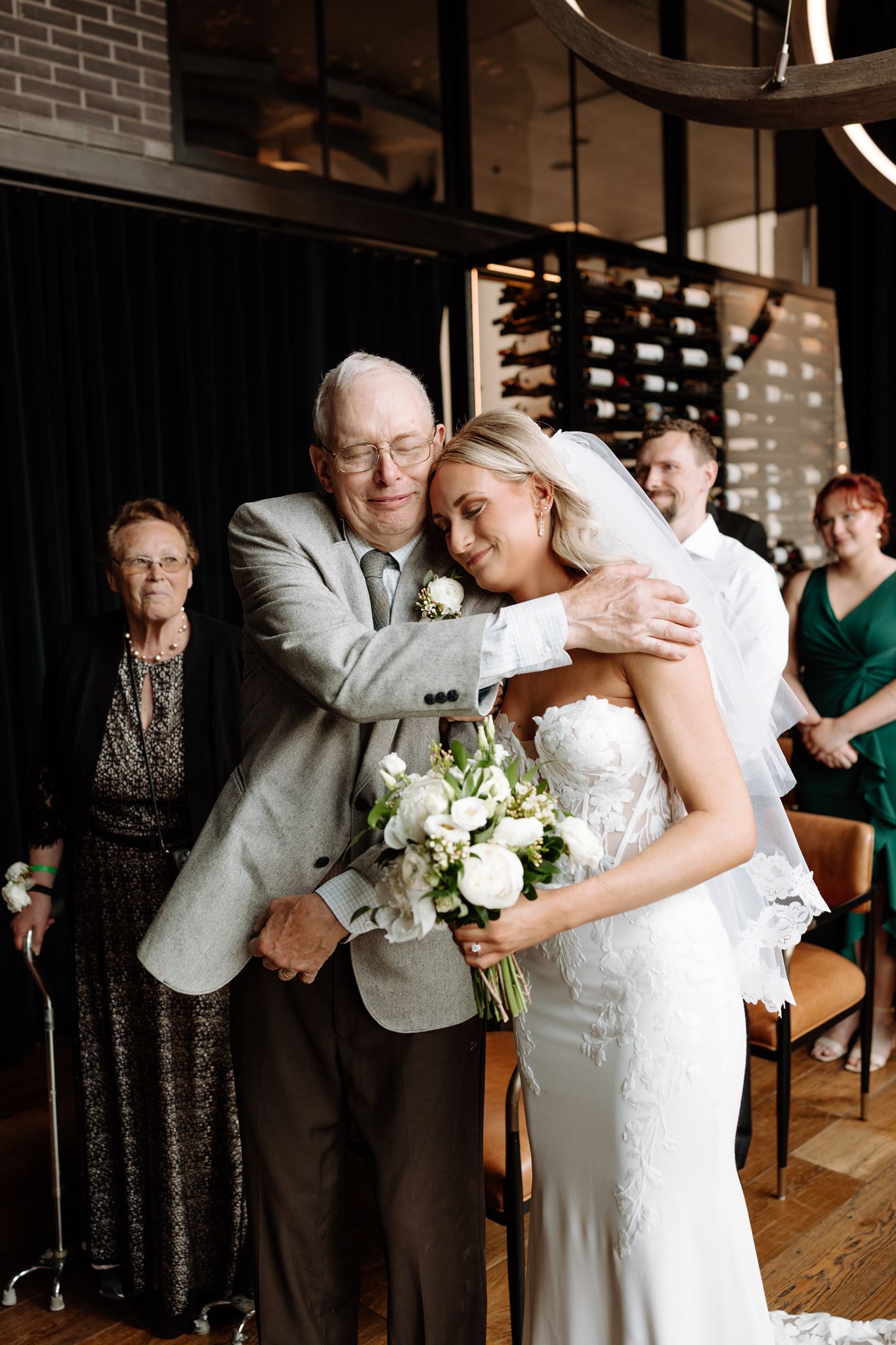 wedding ceremony inside the wine room at the Farnam hotel's dynamite restaurant