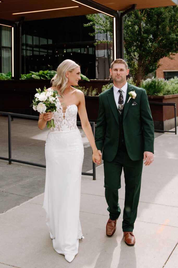 bride and groom outside the farnam hotel