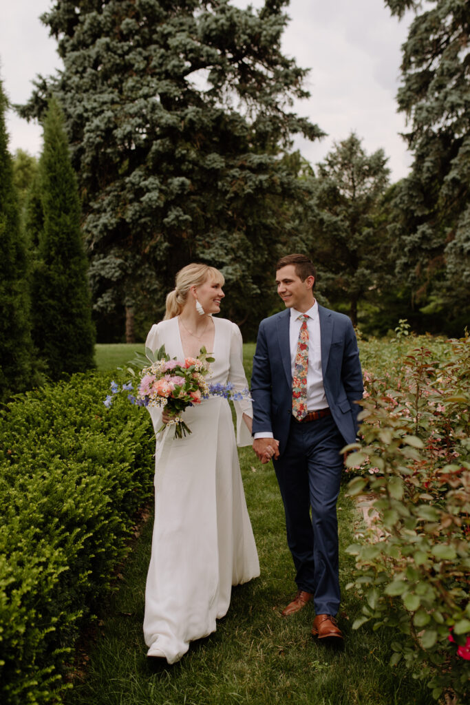 a first look with the bride and groom in the Memorial Park Rose Garden before an intimate wedding ceremony 