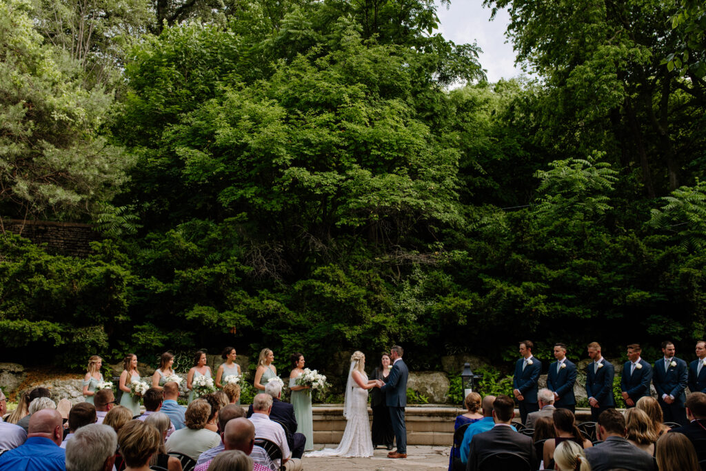 A gorgeous wedding ceremony at the Elmwood Park Grotto in Omaha