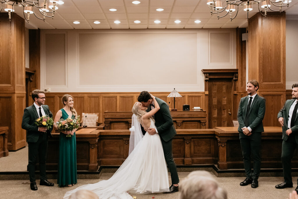 Groom kisses bride in Nebraska elopement