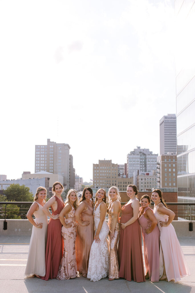 Wedding party overlooking Omaha skyline