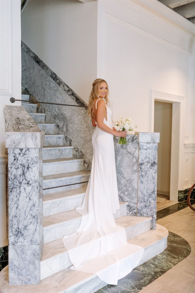 Bridal portrait on stairs at Hotel Indigo wedding in Omaha