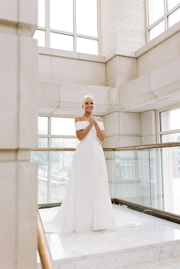 Bride's first look at Leo Ballroom Omaha wedding.